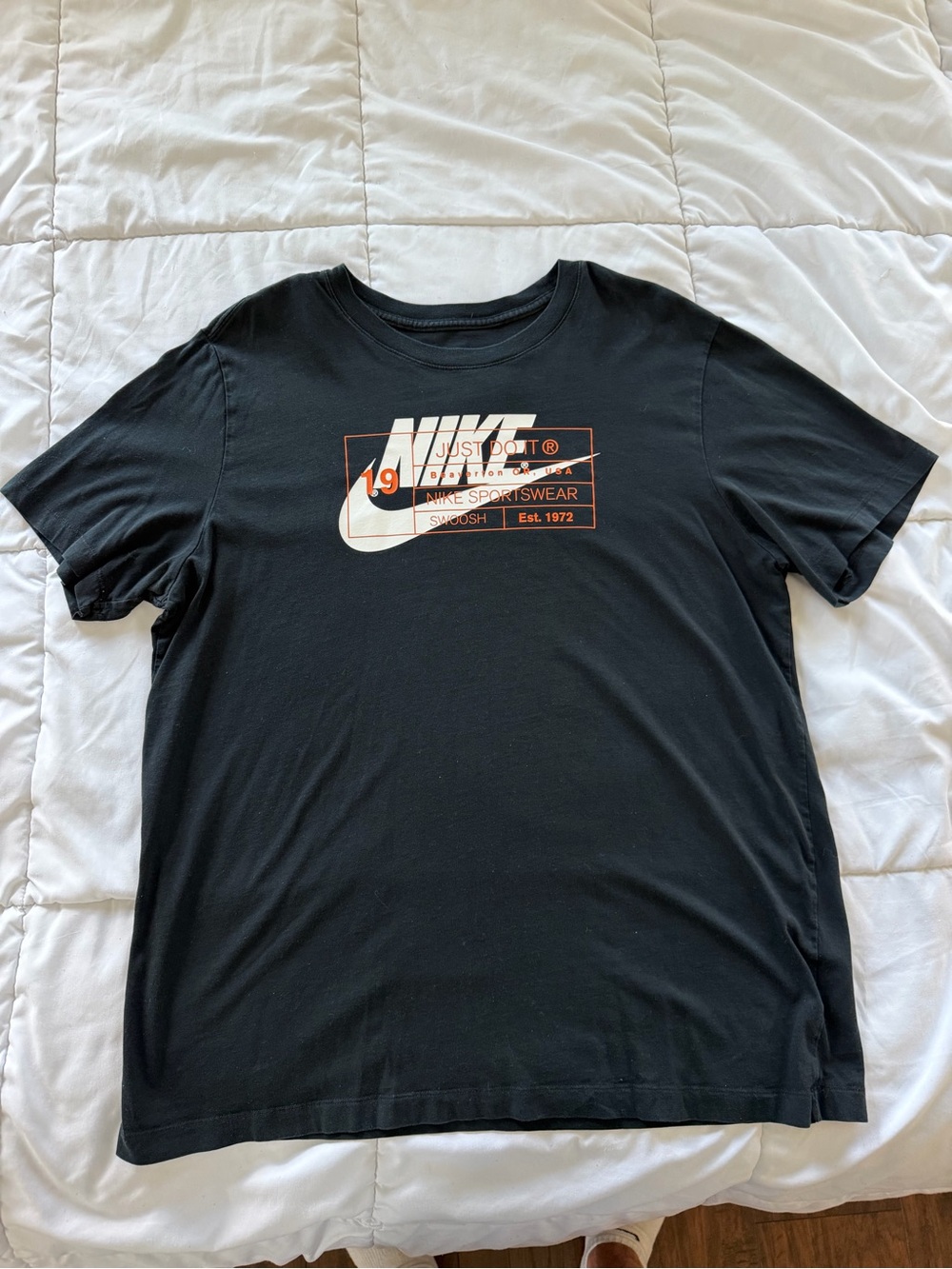 Nike Black Short Sleeve Tee with White and Orange Graphic